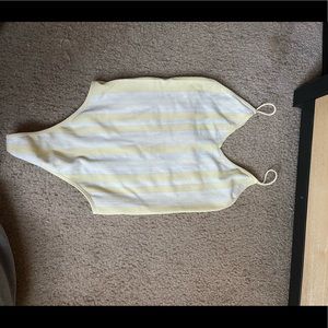 Yellow and white bodysuit